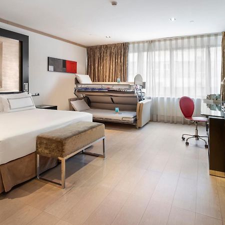 Melia Madrid Princesa Exterior photo A room at the hotel