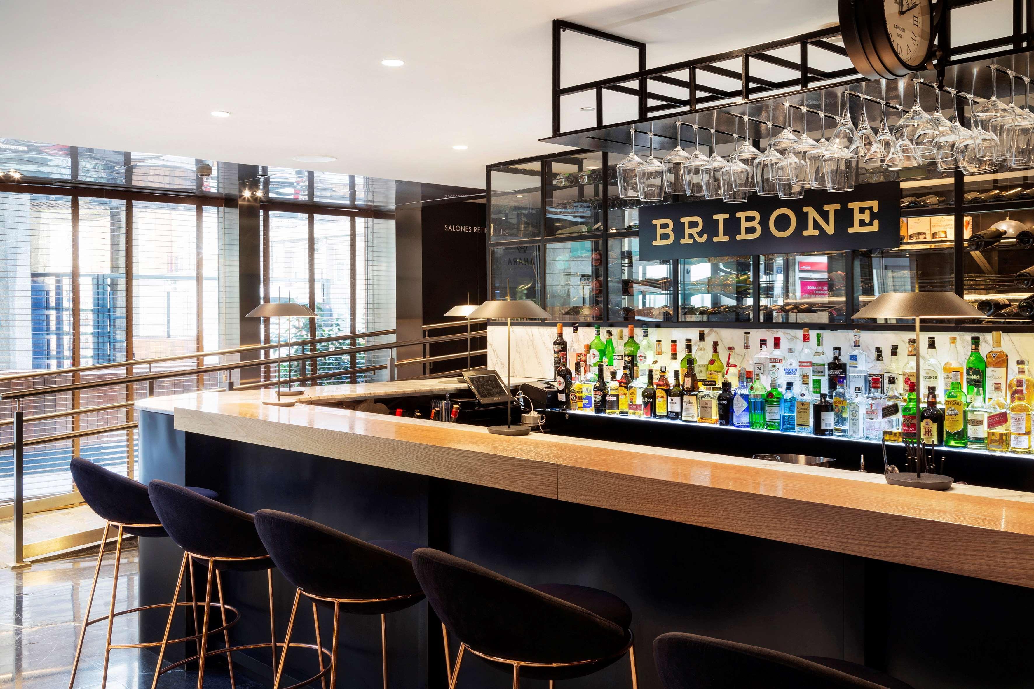 Melia Madrid Princesa Exterior photo The bar at the hotel