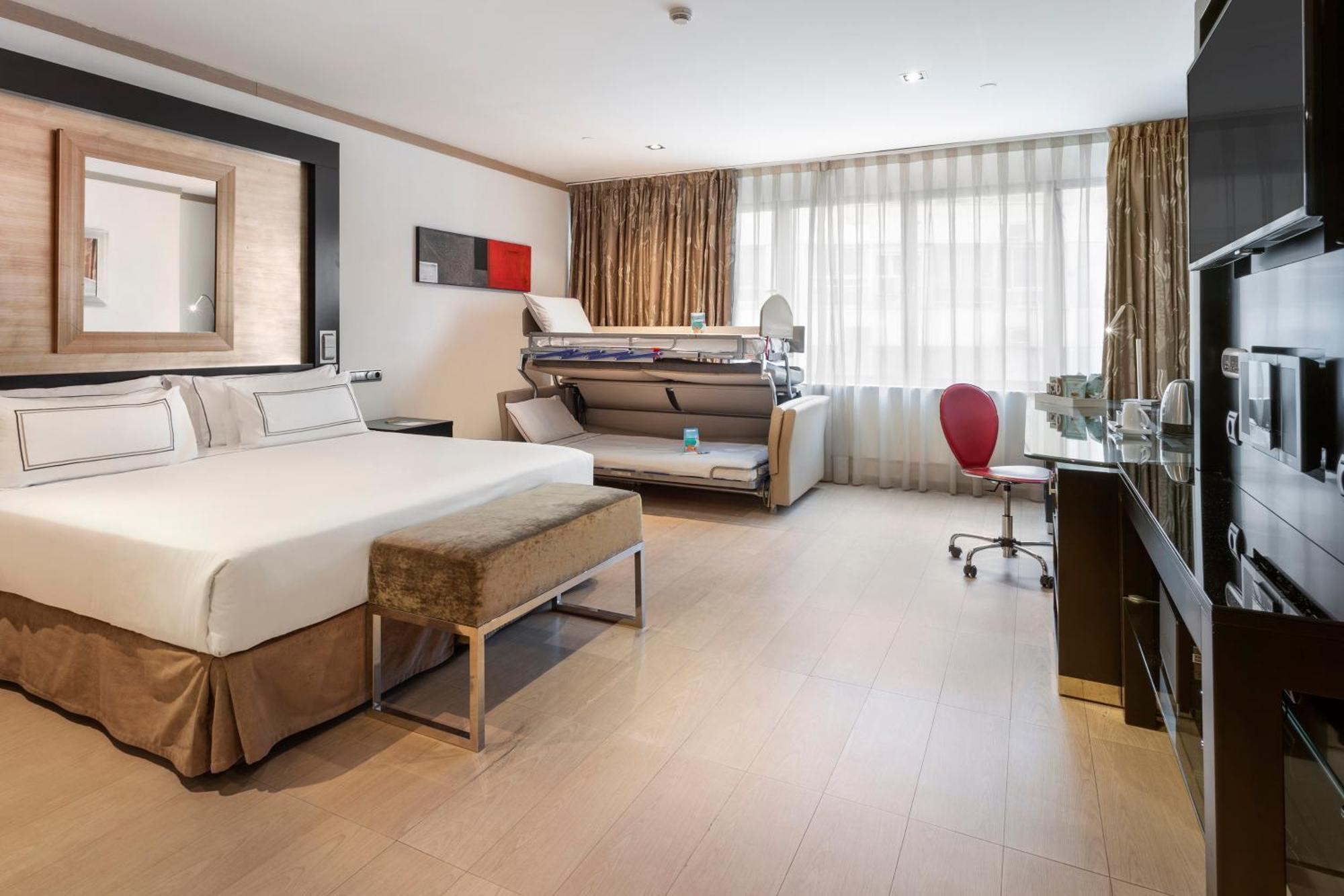 Melia Madrid Princesa Exterior photo A room at the hotel